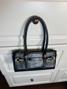 Classic Black Leather Tote Handbag with Gold Accents